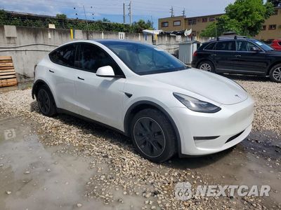 Czwarte zdjęcie samochodu z boku: 2020 TESLA MODEL Y VIN:5YJYGDEE1LF018829 - miniatura
