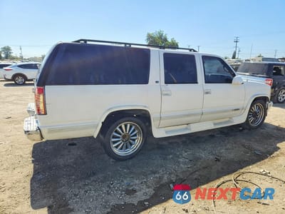 Trzecie zdjęcie samochodu z tyłu: 1999 CHEVROLET SUBURBAN C1500 VIN:3GNEC16R1XG187383 - miniatura