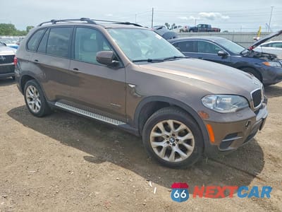 Czwarte zdjęcie samochodu z boku: 2013 BMW X5 XDRIVE35I VIN:5UXZV4C58D0B02368 - miniatura
