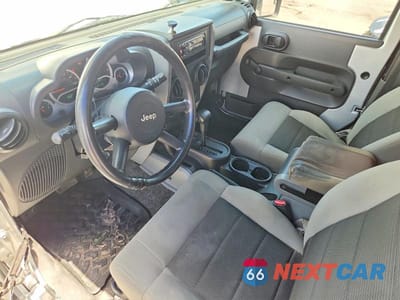 Zdjęcie 8 z 12 samochodu: 2010 JEEP WRANGLER SPORT VIN:1J4AA2D10AL167632 - miniatura