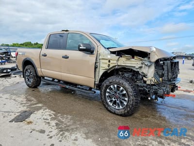 Czwarte zdjęcie samochodu z boku: 2023 NISSAN TITAN PRO-4X VIN:1N6AA1ED1PN112643 - miniatura