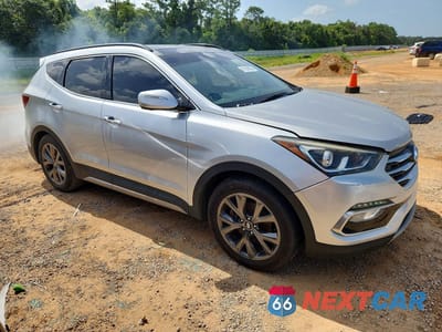 Czwarte zdjęcie samochodu z boku: 2018 HYUNDAI SANTA FE SPORT 2.0T ULTIMATE VIN:5XYZW4LA3JG556493 - miniatura