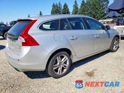 Trzecie zdjęcie samochodu z tyłu: 2015 VOLVO V60 PREMIER VIN:YV1612SB9F1186314 - miniatura