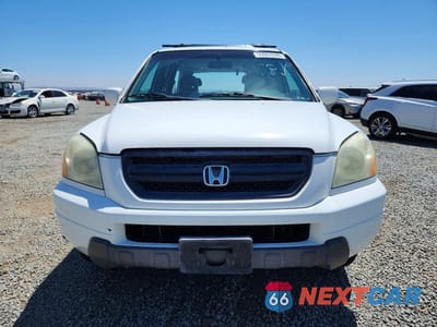 Piąte zdjęcie samochodu w środku: 2005 HONDA PILOT EXL VIN:5FNYF18585B039385 - miniatura