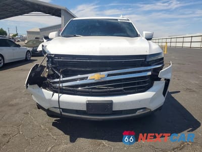 Piąte zdjęcie samochodu w środku: 2021 CHEVROLET SUBURBAN C1500 LT VIN:1GNSCCKD0MR259212 - miniatura