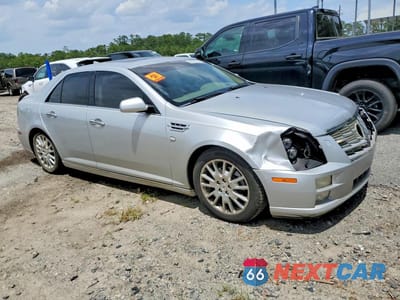 Czwarte zdjęcie samochodu z boku: 2010 CADILLAC STS VIN:1G6DU6EA6A0148152 - miniatura
