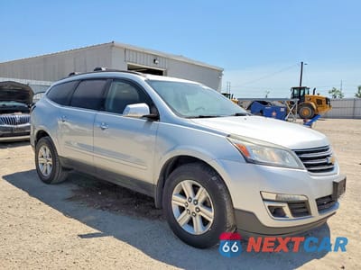 Czwarte zdjęcie samochodu z boku: 2014 CHEVROLET TRAVERSE LT VIN:1GNKRHKD0EJ153256 - miniatura