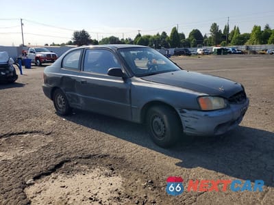 Czwarte zdjęcie samochodu z boku: 2000 HYUNDAI ACCENT L VIN:KMHCF35G7YU039171 - miniatura