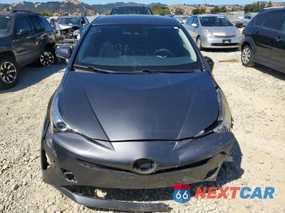 Piąte zdjęcie samochodu w środku: 2017 TOYOTA PRIUS TWO ECO VIN:JTDKARFU4H3030911 - miniatura