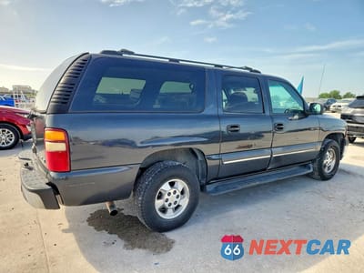 Trzecie zdjęcie samochodu z tyłu: 2003 CHEVROLET SUBURBAN C1500 VIN:3GNEC16Z03G213255 - miniatura