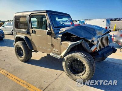 Czwarte zdjęcie samochodu z boku: 2004 JEEP WRANGLER / TJ SE VIN:1J4FA29154P741704 - miniatura