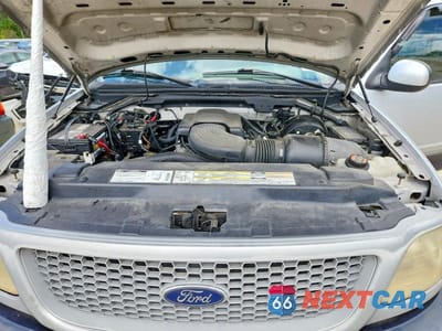 Zdjęcie 11 z 12 samochodu: 1999 FORD F150 VIN:1FTRX18W4XNA79350 - miniatura