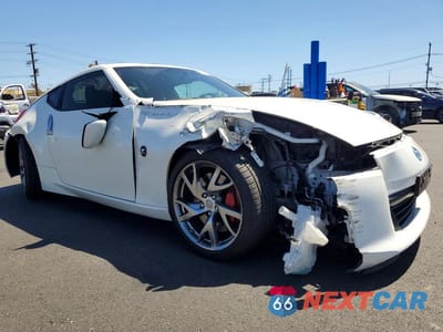 Czwarte zdjęcie samochodu z boku: 2014 NISSAN 370Z TOURING VIN:JN1AZ4EHXEM632331 - miniatura