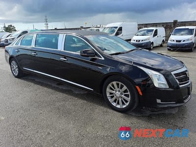 Czwarte zdjęcie samochodu z boku: 2017 CADILLAC XTS LIMOUSINE VIN:2GEXG6U38H9550184 - miniatura