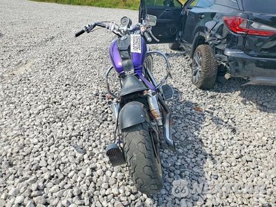 Czwarte zdjęcie samochodu z boku: 1997 HONDA VT1100 C2 VIN:1HFSC3256VA200429 - miniatura