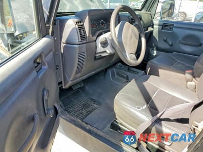 Zdjęcie 8 z 13 samochodu: 2002 JEEP WRANGLER / TJ SE VIN:1J4FA29P82P729340 - miniatura