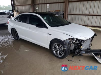 Czwarte zdjęcie samochodu z boku: 2021 VOLKSWAGEN JETTA S VIN:3VWC57BU9MM002482 - miniatura