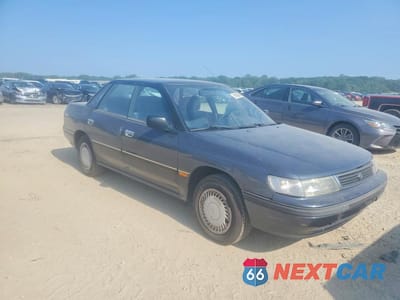 Czwarte zdjęcie samochodu z boku: 1993 SUBARU LEGACY L VIN:4S3BC6331P9648428 - miniatura