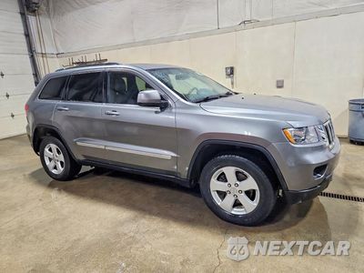 Czwarte zdjęcie samochodu z boku: 2012 JEEP GRAND CHEROKEE LAREDO VIN:1C4RJFAGXCC181582 - miniatura