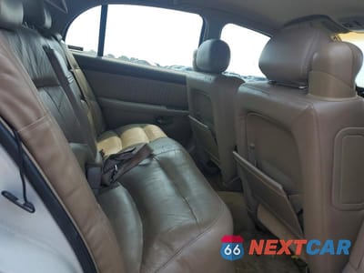 Zdjęcie 10 z 13 samochodu: 2000 BUICK PARK AVENUE ULTRA VIN:1G4CU5217Y4156508 - miniatura