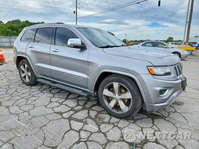 Czwarte zdjęcie samochodu z boku: 2014 JEEP GRAND CHEROKEE OVERLAND VIN:1C4RJFCG4EC233028 - miniatura