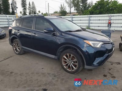 Czwarte zdjęcie samochodu z boku: 2018 TOYOTA RAV4 LIMITED VIN:JTMYFREV9JJ161744 - miniatura