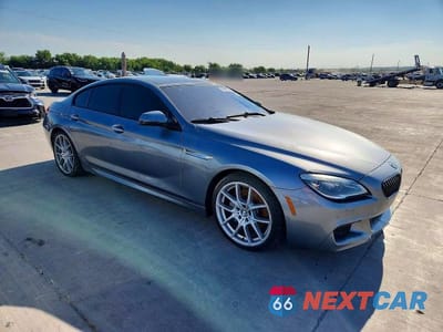 Czwarte zdjęcie samochodu z boku: 2016 BMW 640 I GRAN COUPE VIN:WBA6D0C56GG432385 - miniatura