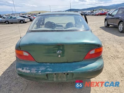 Zdjęcie 6 z 13 samochodu: 1997 HYUNDAI ELANTRA BASE VIN:KMHJF24M0VU594077 - miniatura