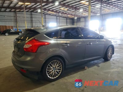 Trzecie zdjęcie samochodu z tyłu: 2012 FORD FOCUS SEL VIN:1FAHP3M20CL288011 - miniatura