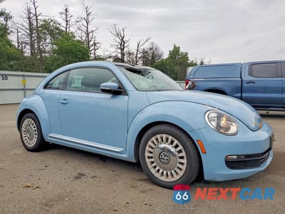 Czwarte zdjęcie samochodu z boku: 2014 VOLKSWAGEN BEETLE VIN:3VWJP7AT4EM605884 - miniatura