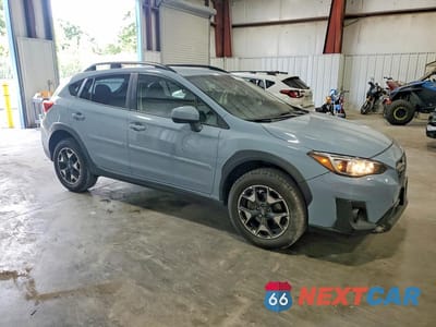Czwarte zdjęcie samochodu z boku: 2020 SUBARU CROSSTREK PREMIUM VIN:JF2GTAPCXLH270176 - miniatura