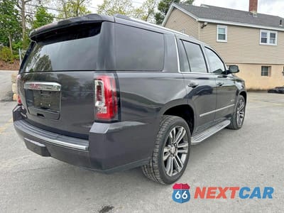 Czwarte zdjęcie samochodu z boku: 2016 GMC YUKON DENALI VIN:1GKS2CKJ1GR129613 - miniatura