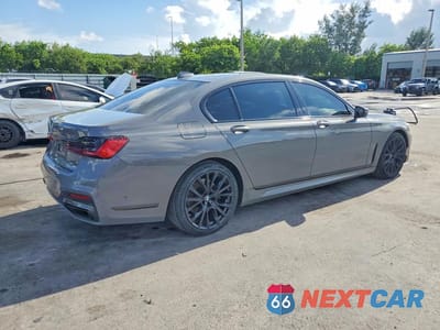 Trzecie zdjęcie samochodu z tyłu: 2022 BMW 740 I VIN:WBA7T2C08NCJ42872 - miniatura