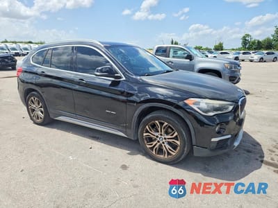 Czwarte zdjęcie samochodu z boku: 2017 BMW X1 XDRIVE28I VIN:WBXHT3Z37H4A53653 - miniatura