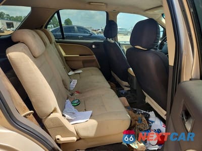 Zdjęcie 10 z 12 samochodu: 2008 FORD TAURUS X SEL VIN:1FMDK05W28GA00735 - miniatura