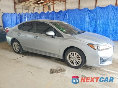 Czwarte zdjęcie samochodu z boku: 2017 SUBARU IMPREZA PREMIUM VIN:4S3GKAB64H3625852 - miniatura