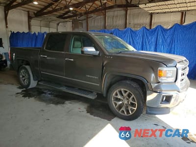 Czwarte zdjęcie samochodu z boku: 2014 GMC SIERRA K1500 SLT VIN:3GTU2VEC5EG391869 - miniatura