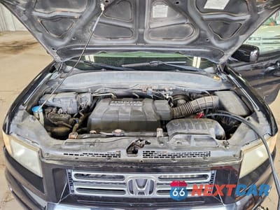 Zdjęcie 11 z 12 samochodu: 2006 HONDA RIDGELINE RTL VIN:2HJYK16556H526436 - miniatura