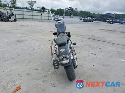 Czwarte zdjęcie samochodu z boku: 2000 HARLEY-DAVIDSON XL883 VIN:1HD4CAM10YK137360 - miniatura
