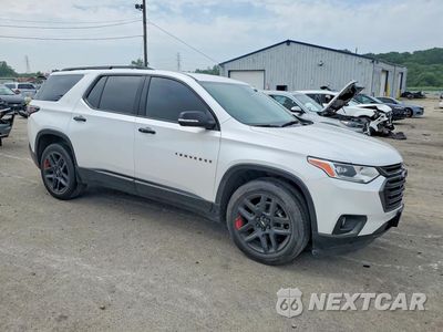 Czwarte zdjęcie samochodu z boku: 2021 CHEVROLET TRAVERSE PREMIER VIN:1GNEVKKW7MJ269690 - miniatura