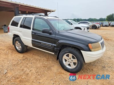 Czwarte zdjęcie samochodu z boku: 2001 JEEP GRAND CHEROKEE LIMITED VIN:1J4GW58N71C612734 - miniatura