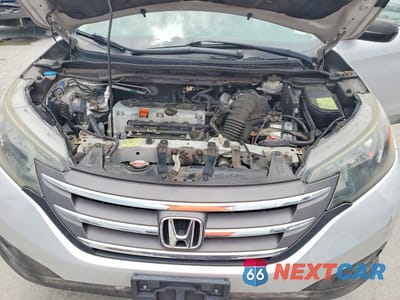Zdjęcie 12 z 13 samochodu: 2014 HONDA CR-V LX VIN:2HKRM4H31EH681104 - miniatura
