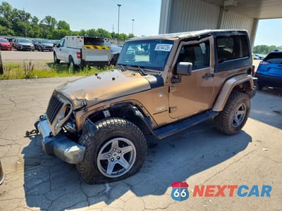 2015 JEEP WRANGLER SAHARA 1C4AJWBG4FL607492 - główne zdjęcie licytacji z USA - miniatura