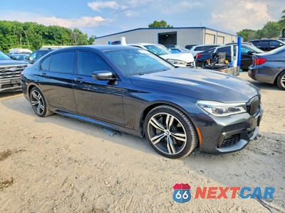 Czwarte zdjęcie samochodu z boku: 2018 BMW 750 I VIN:WBA7F0C52JGM23883 - miniatura