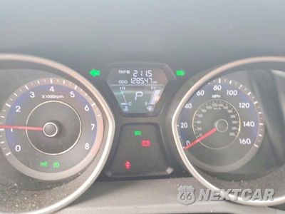 Zdjęcie 9 z 12 samochodu: 2013 HYUNDAI ELANTRA LIMITED VIN:KMHDH4AE5DU505831 - miniatura