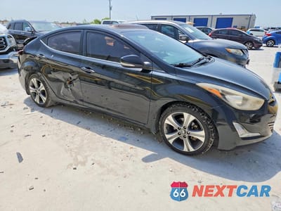 Czwarte zdjęcie samochodu z boku: 2014 HYUNDAI ELANTRA SPORT VIN:KMHDH4AH0EU174684 - miniatura