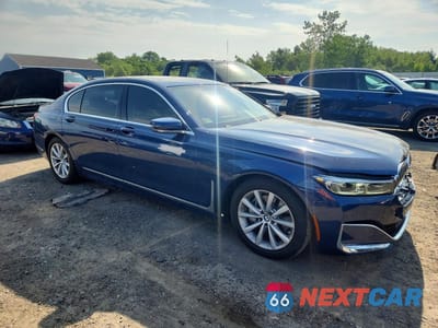 Czwarte zdjęcie samochodu z boku: 2022 BMW 740 XI VIN:WBA7T4C0XNCK11394 - miniatura