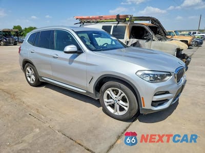 Czwarte zdjęcie samochodu z boku: 2020 BMW X3 SDRIVE30I VIN:5UXTY3C00L9B69956 - miniatura