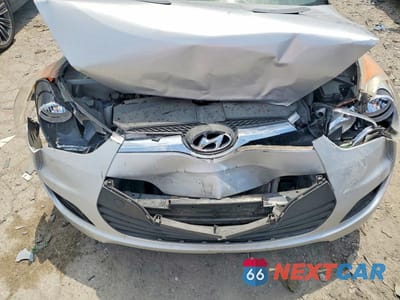 Zdjęcie 11 z 12 samochodu: 2012 HYUNDAI VELOSTER BASE VIN:KMHTC6AD1CU042355 - miniatura