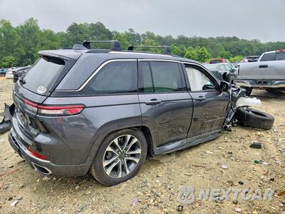 Trzecie zdjęcie samochodu z tyłu: 2022 JEEP GRAND CHEROKEE VIN:1C4RJHDG5N8591106 - miniatura